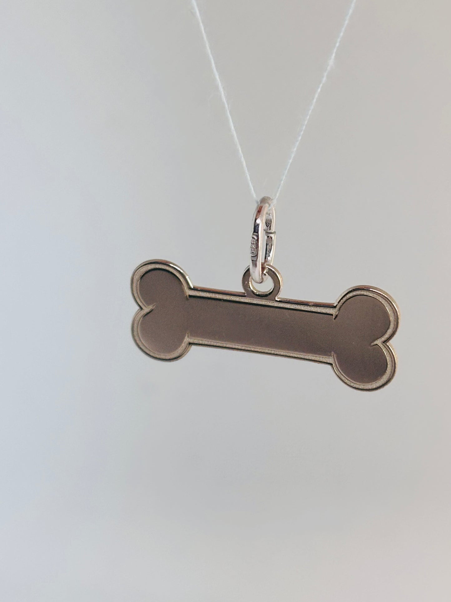 Ciondolo osso argento Pizzico