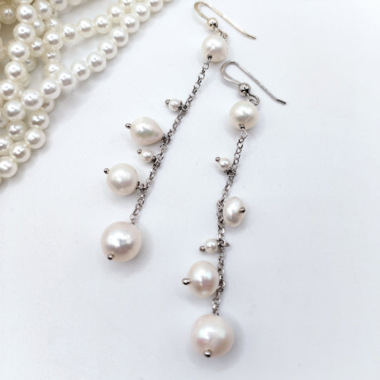 Orecchini pendenti perle